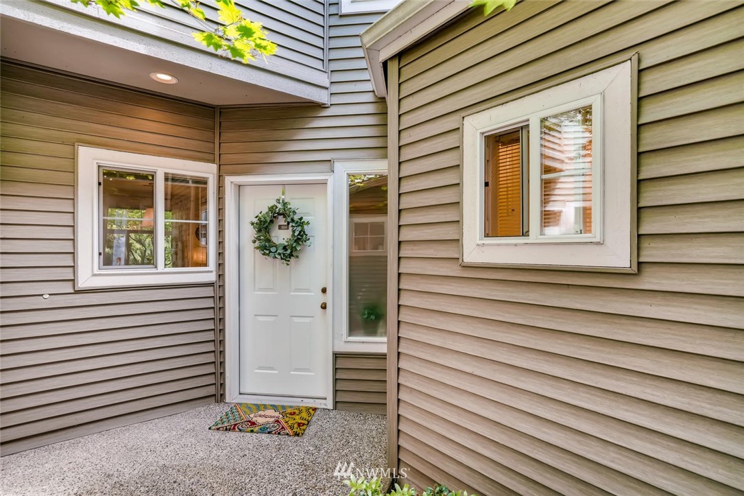 22715 4th Avenue West, Unit 104 Bothell, WA 98021 - Photo 2 of 27 a view of a house with a door and a window