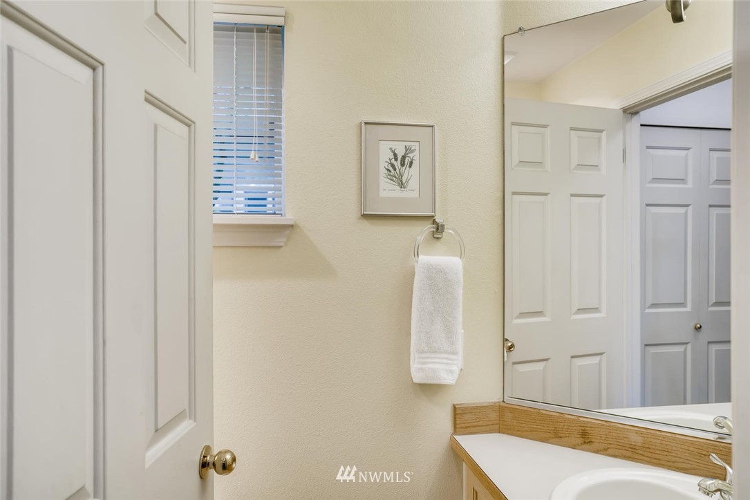 22715 4th Avenue West, Unit 104 Bothell, WA 98021 - Photo 12 of 27 a bathroom with a tub and shower