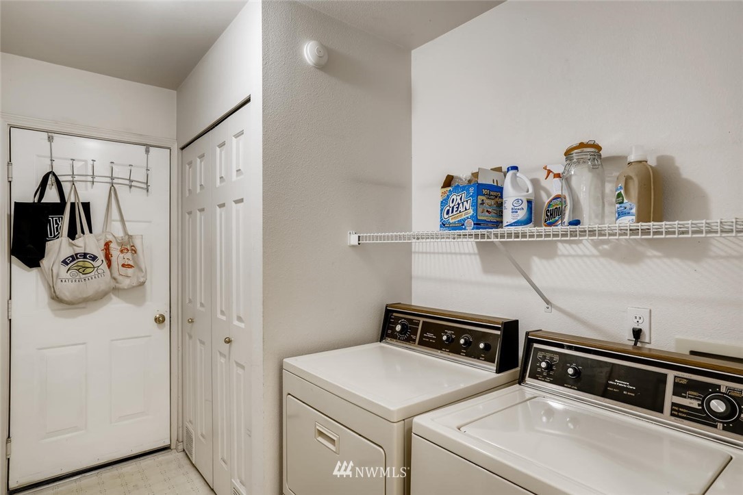 22715 4th Avenue West, Unit 104 Bothell, WA 98021 - Photo 20 of 27 a utility room with sink dryer and washer