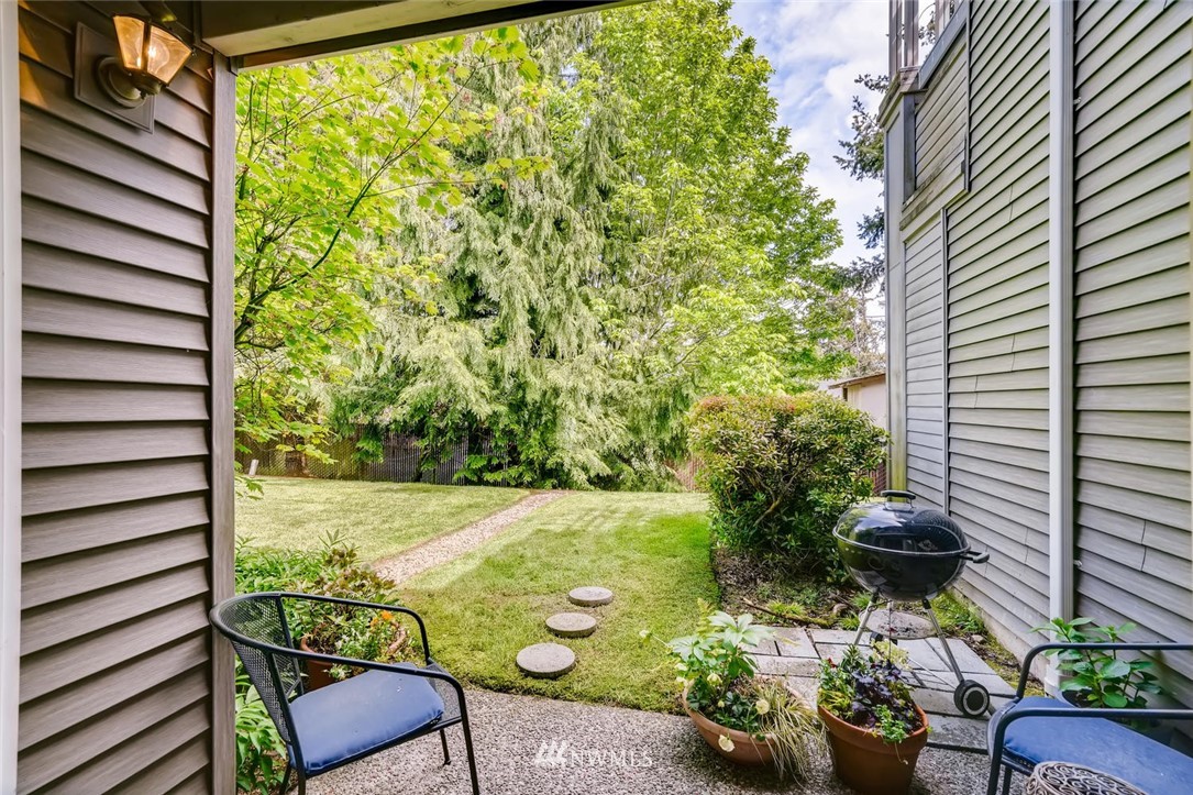 22715 4th Avenue West, Unit 104 Bothell, WA 98021 - Photo 22 of 27 a view of a back yard from a patio