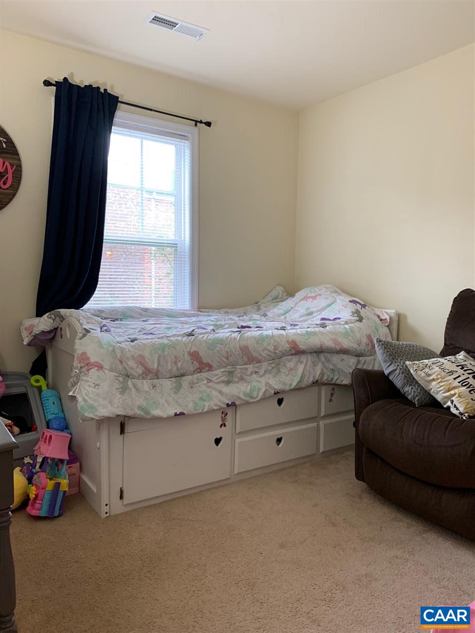 2452 North Berkshire Road Charlottesville, VA 22901 - Photo 13 of 24 a bedroom with a bed and a window