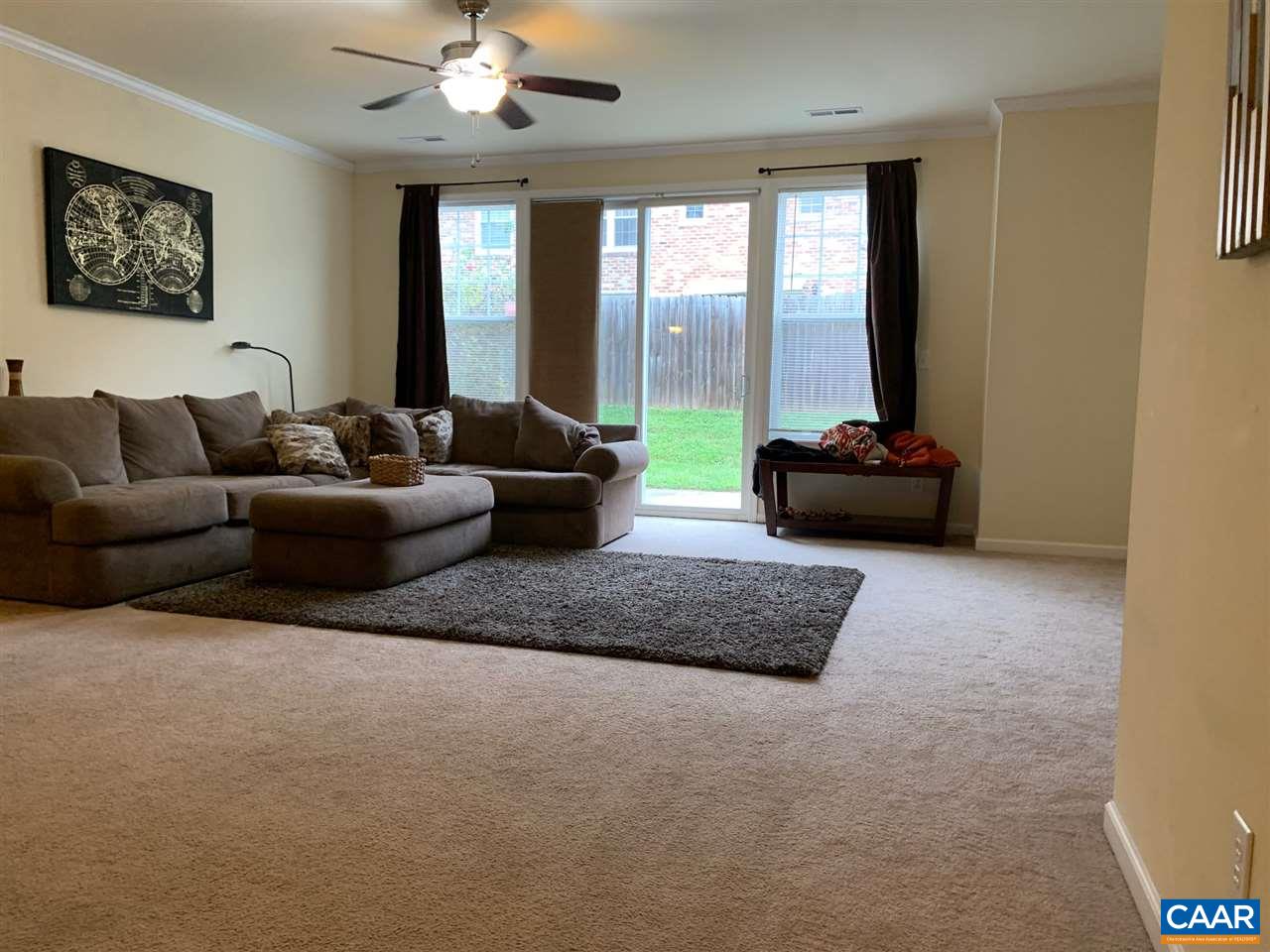 2452 North Berkshire Road Charlottesville, VA 22901 - Photo 7 of 24 a living room with furniture and a large window