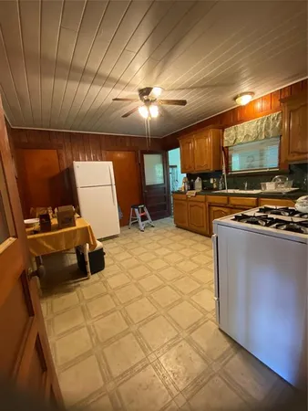 a room with furniture and a flat screen tv