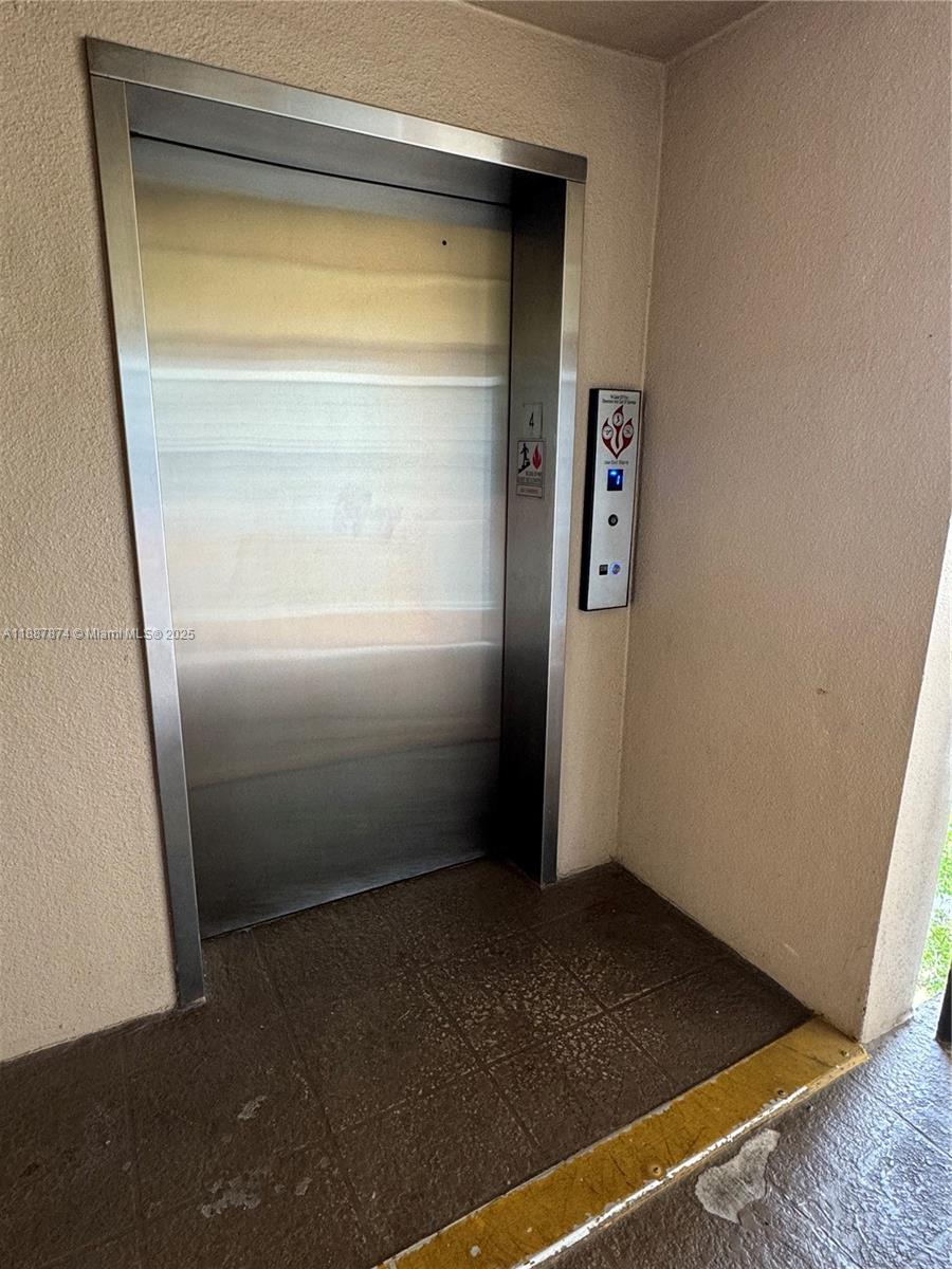 13550 Southwest 6th Court, Unit 409A Pembroke Pines, FL 33027 - Photo 17 of 20 a view of an empty room