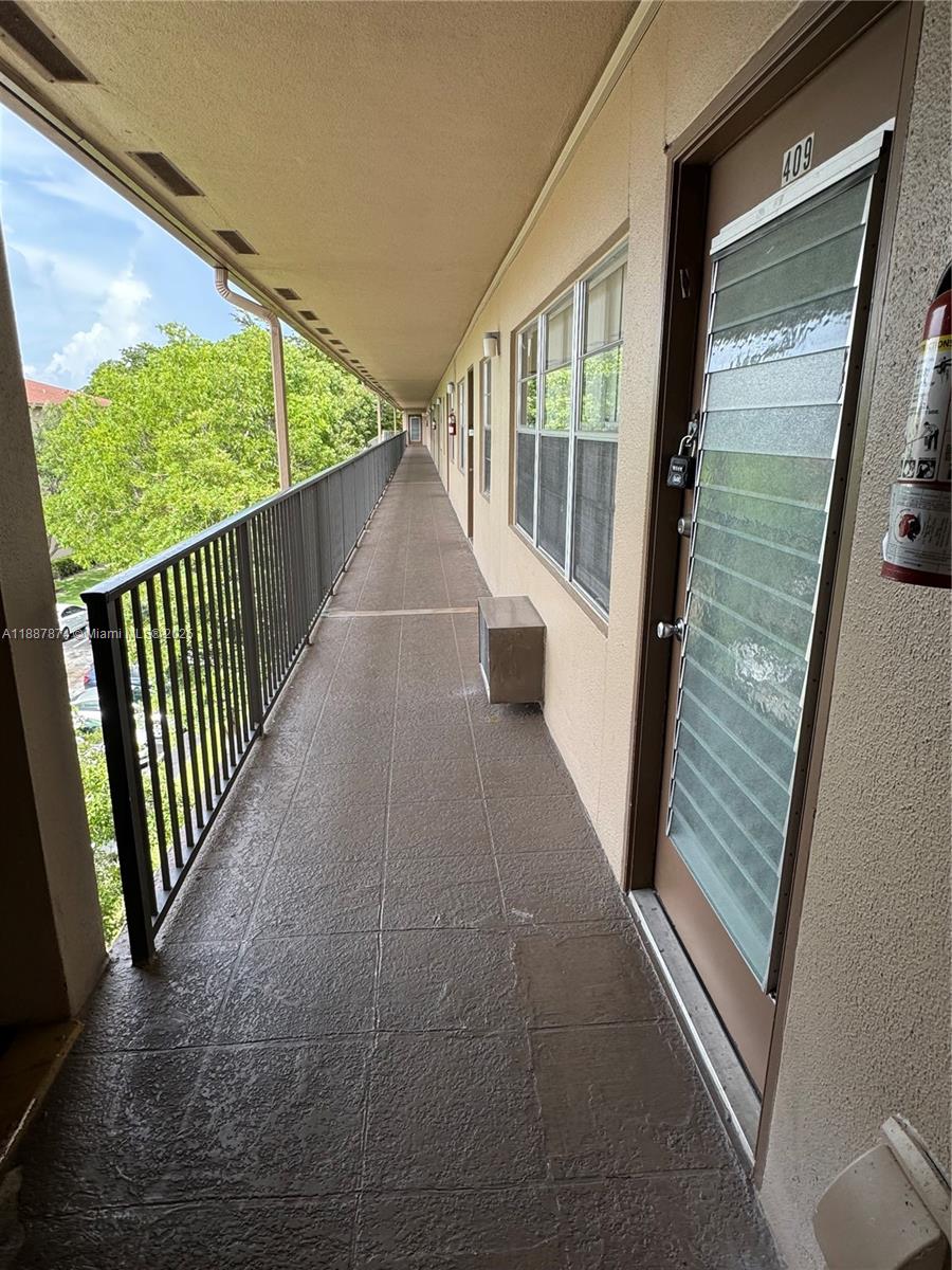 13550 Southwest 6th Court, Unit 409A Pembroke Pines, FL 33027 - Photo 18 of 20 a view of a porch