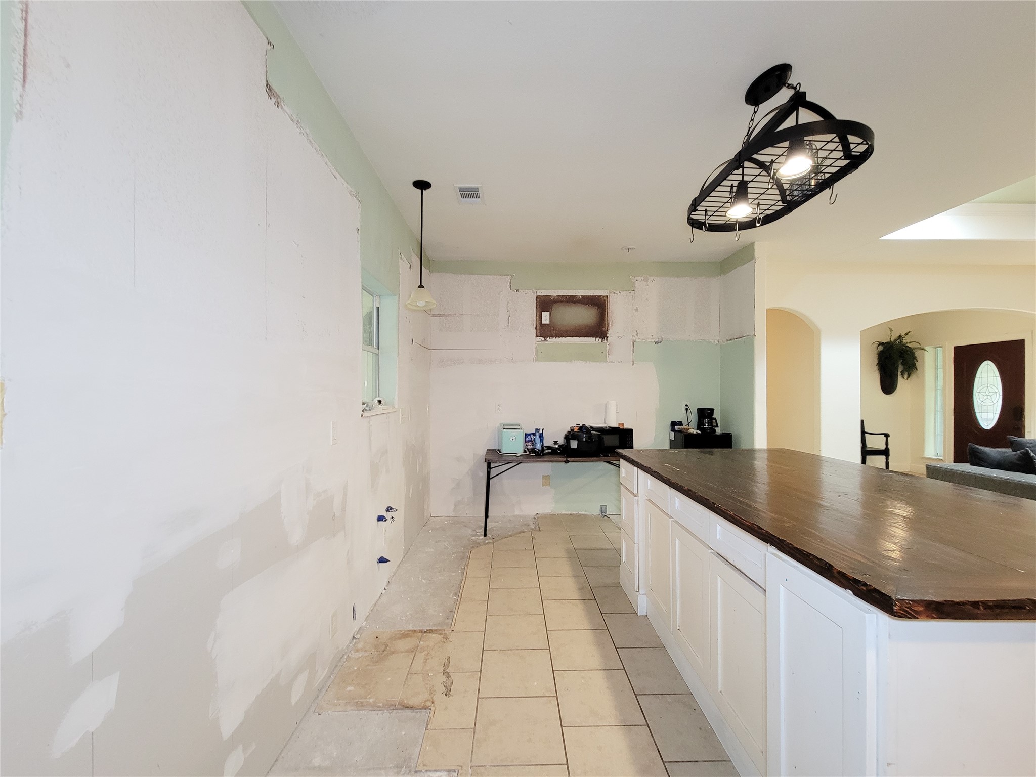 2011 Old Ox Road Spring, TX 77386 - Photo 22 of 38 a kitchen with stainless steel appliances granite countertop a sink and a refrigerator