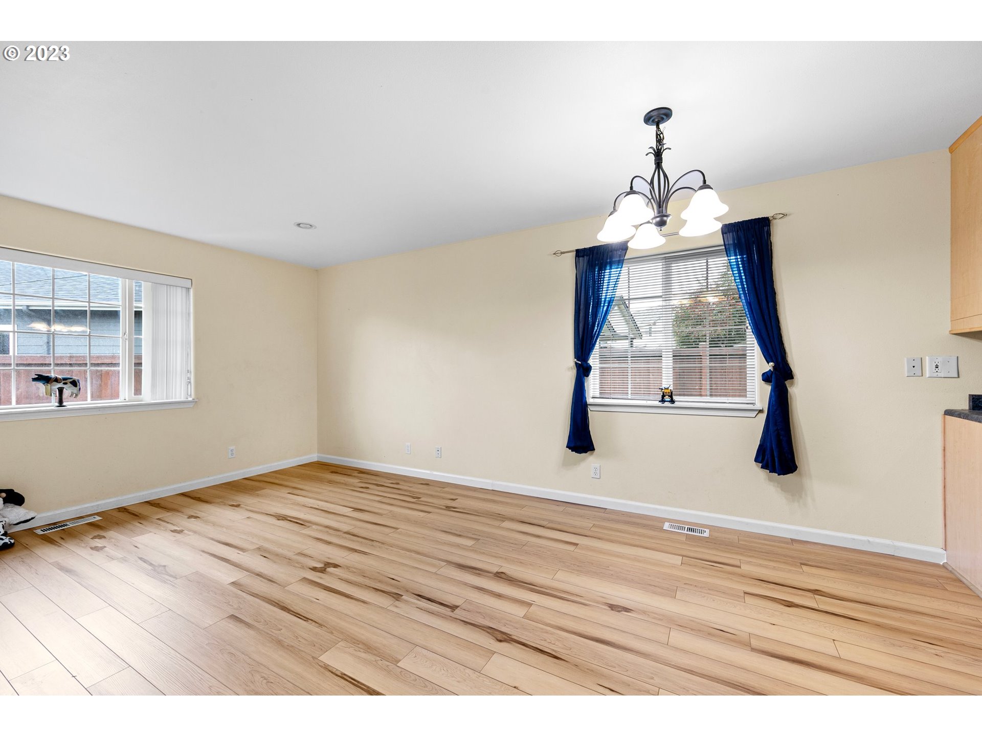 1038 Diamond Street Springfield, OR 97477 - Photo 14 of 48 a view of empty room with wooden floor