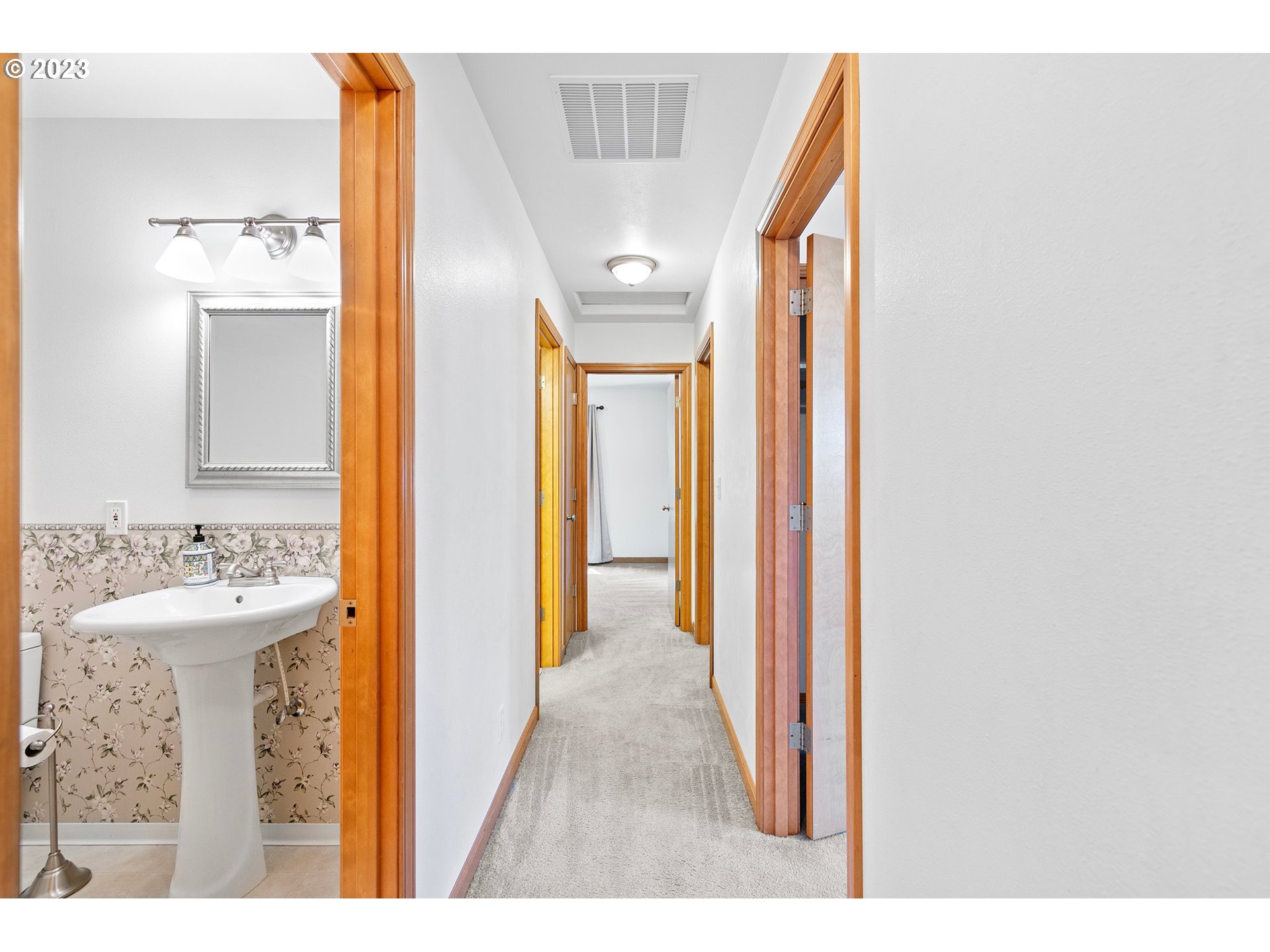 1038 Diamond Street Springfield, OR 97477 - Photo 17 of 48 a view of a hallway view with wooden floor