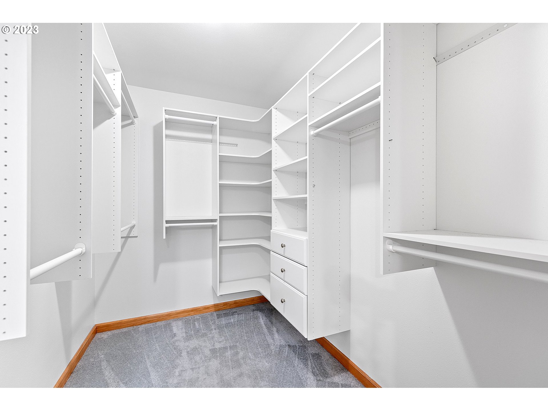 1038 Diamond Street Springfield, OR 97477 - Photo 23 of 48 a view of walk in closet with empty racks