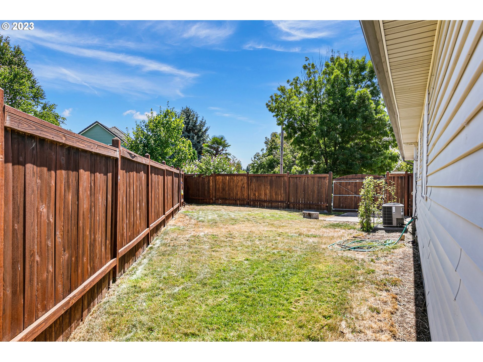 1038 Diamond Street Springfield, OR 97477 - Photo 39 of 48 a swimming pool with wooden fence