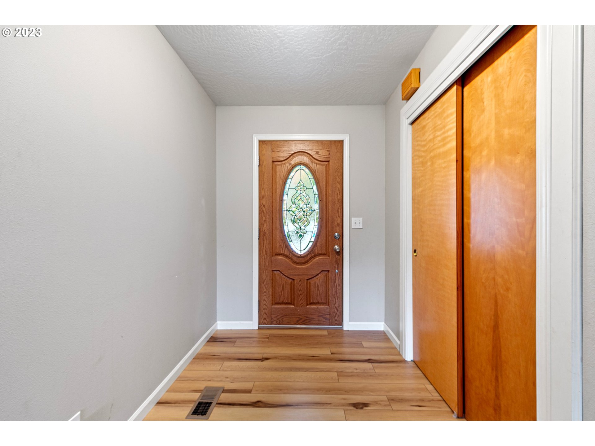 1038 Diamond Street Springfield, OR 97477 - Photo 5 of 48 a view of a entryway door with wooden floor