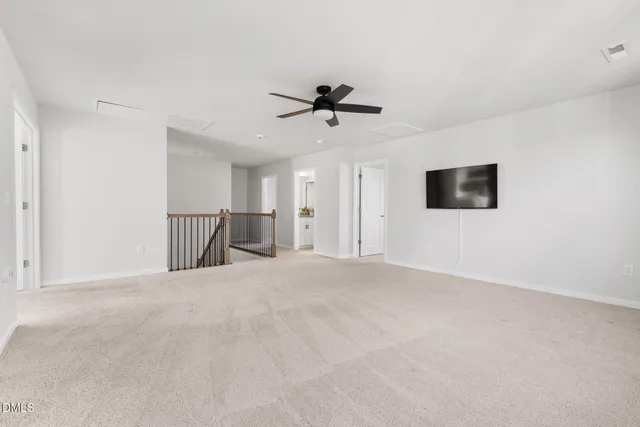 a view of a livingroom with a flat screen tv
