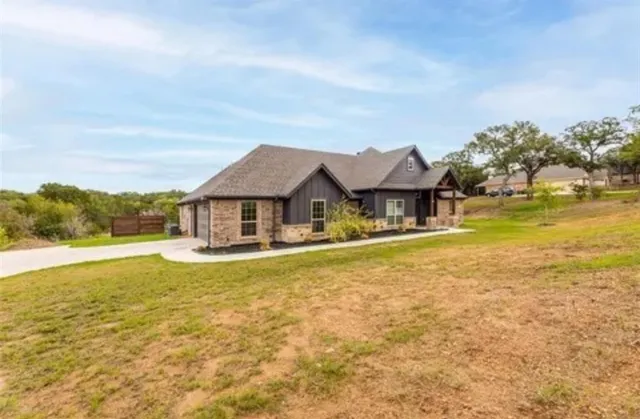 a view of a house with a swimming pool