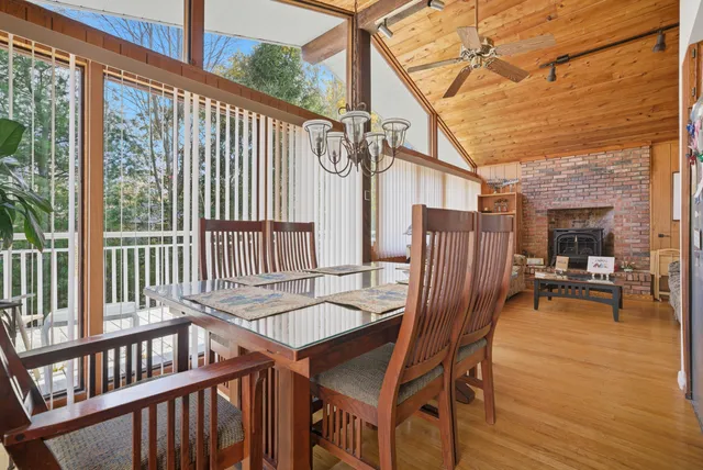 a view of a patio with a table and chairs