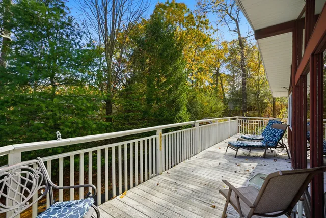 a view of balcony with furniture