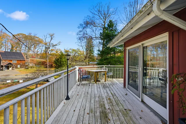 a view of balcony with furniture