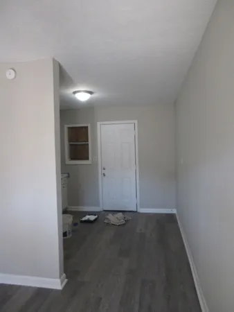 an empty room with a door
