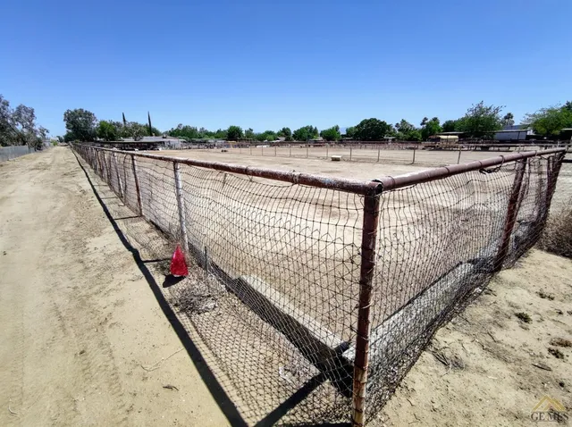 a view of balcony with wooden floor and city view