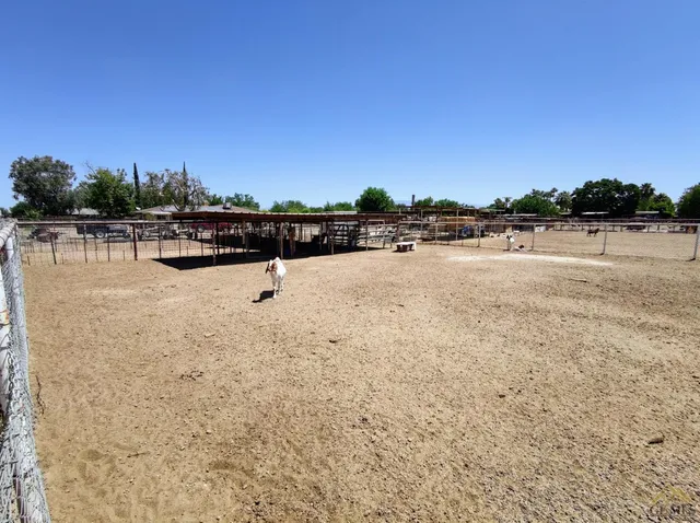 a view of a lake with houses in the back