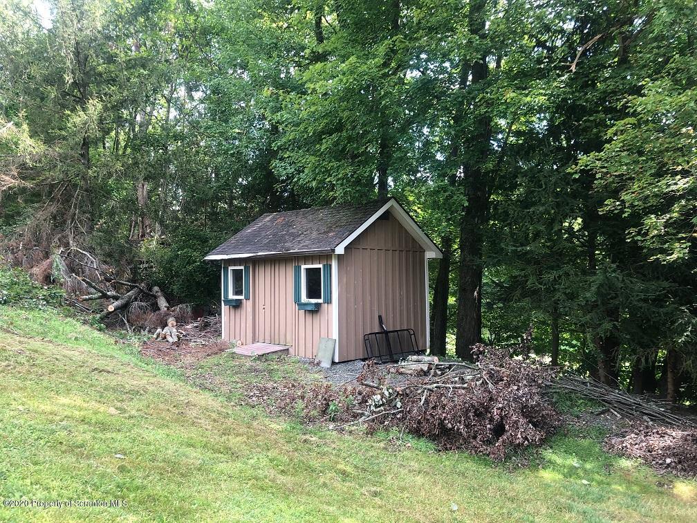 164 Halstead Road Union Dale, PA 18470 - Photo 32 of 36 a view of a house with a yard