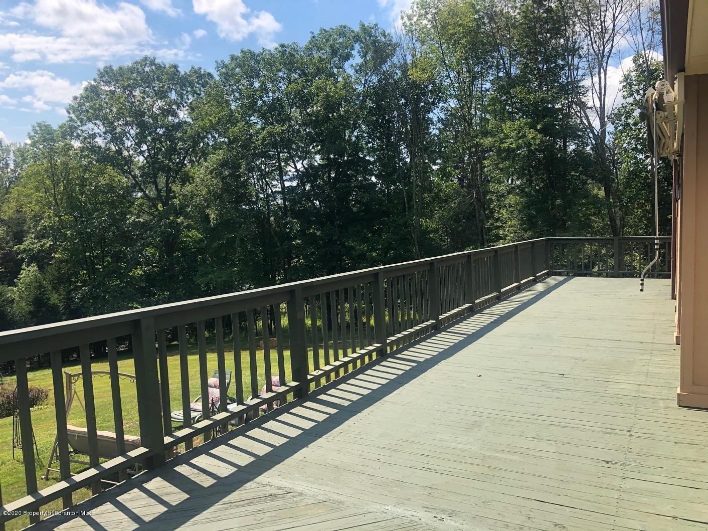 164 Halstead Road Union Dale, PA 18470 - Photo 33 of 36 a view of balcony and deck