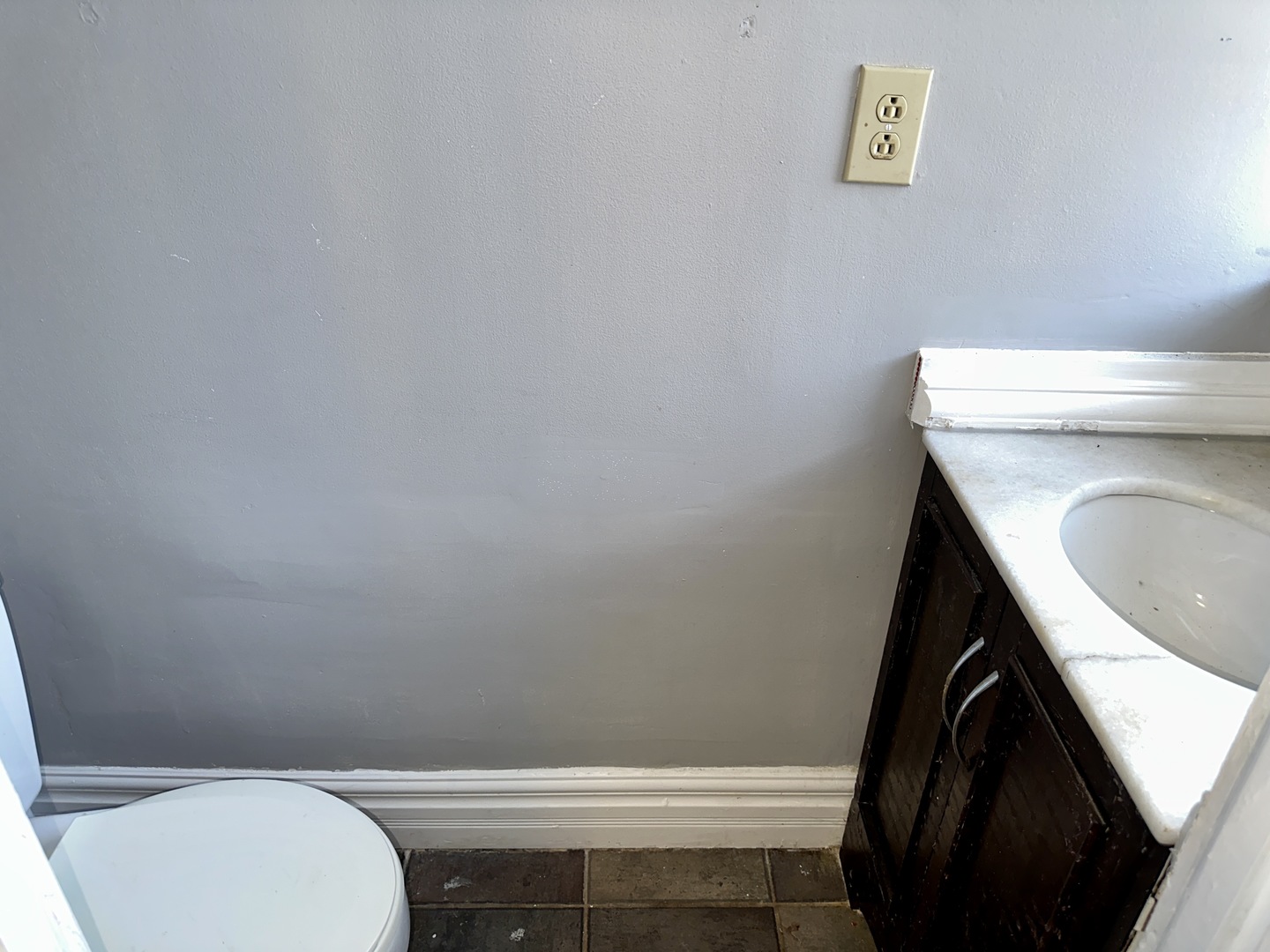 2207 East 67th Street, Unit 2 Chicago, IL 60649 - Photo 12 of 13 a bathroom with a toilet and a sink