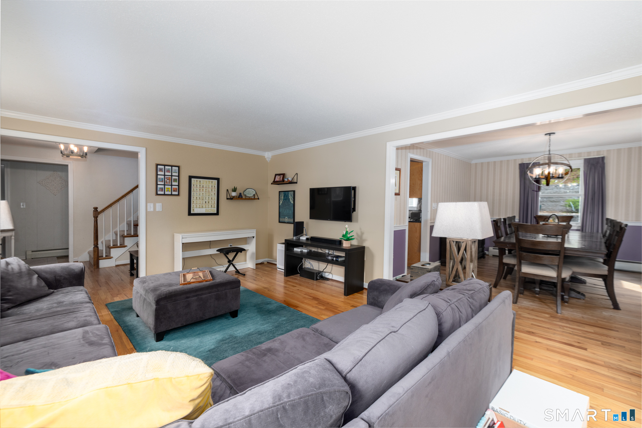 14 Crosswood Road Farmington, CT 06085 - Photo 19 of 39 a living room with furniture and a flat screen tv