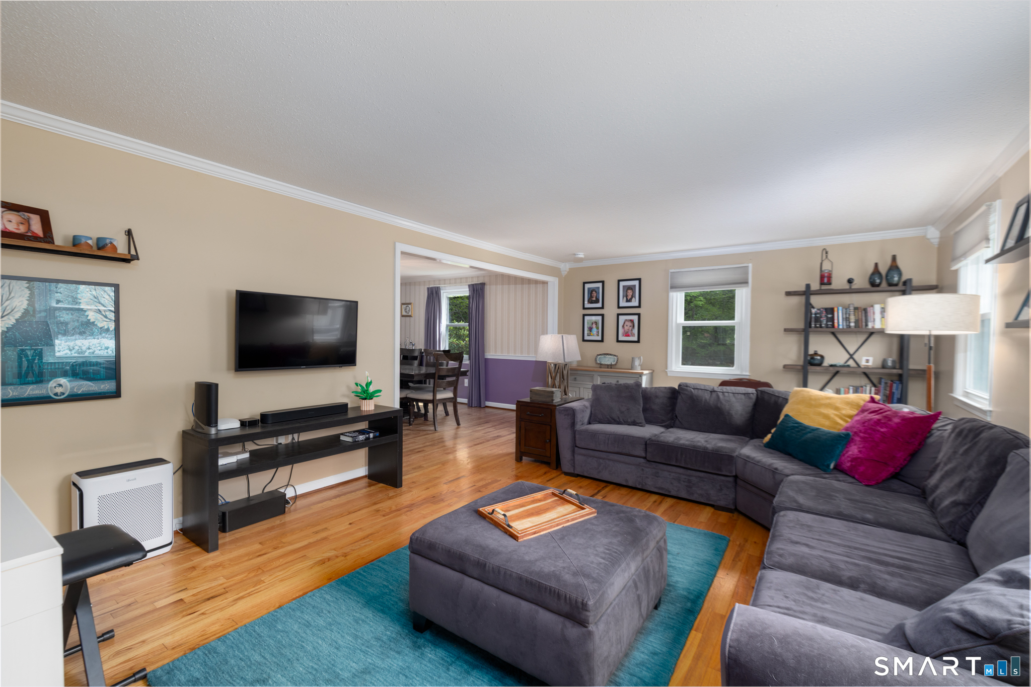 14 Crosswood Road Farmington, CT 06085 - Photo 20 of 39 a living room with furniture and a flat screen tv