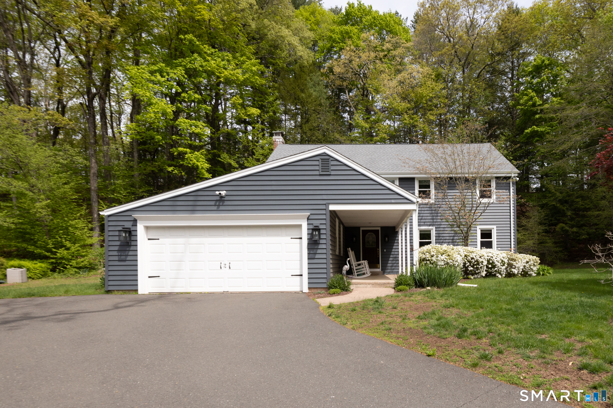 14 Crosswood Road Farmington, CT 06085 - Photo 2 of 39 a front view of a house with garden