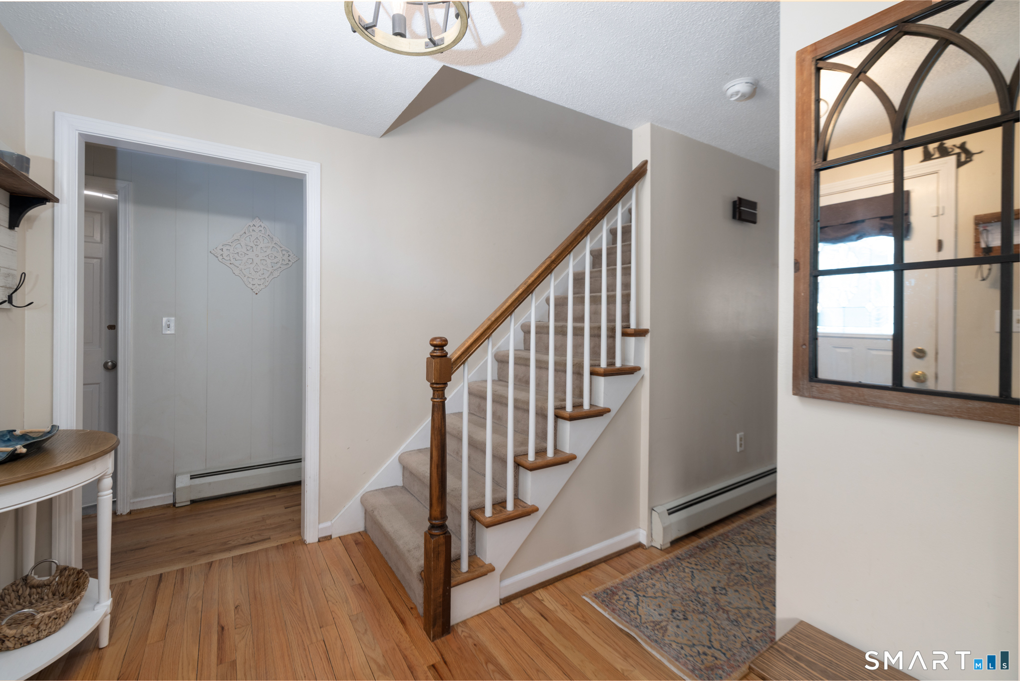 14 Crosswood Road Farmington, CT 06085 - Photo 21 of 39 a view of an entryway with wooden floor and door