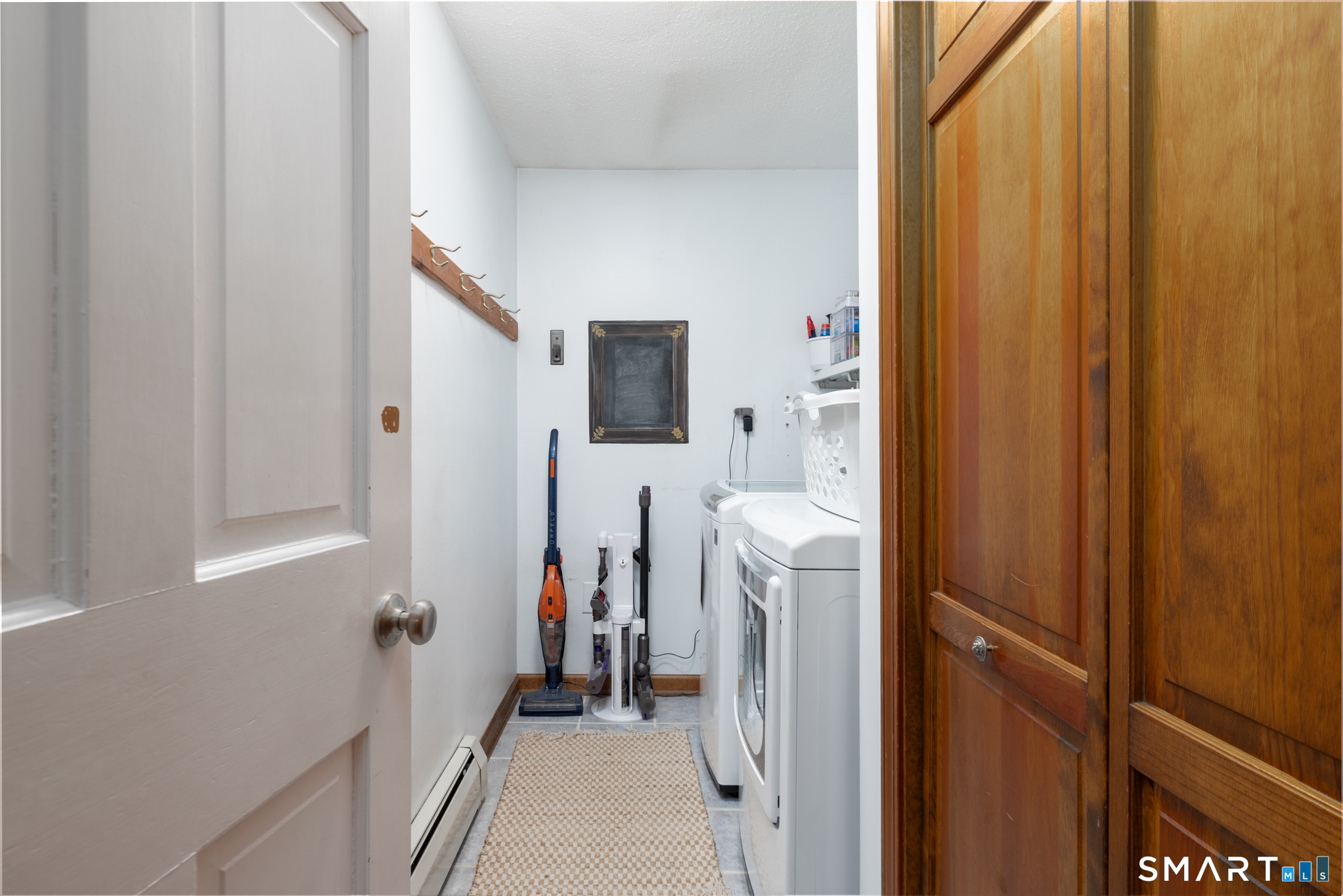 14 Crosswood Road Farmington, CT 06085 - Photo 25 of 39 a view of a bathroom from a hallway