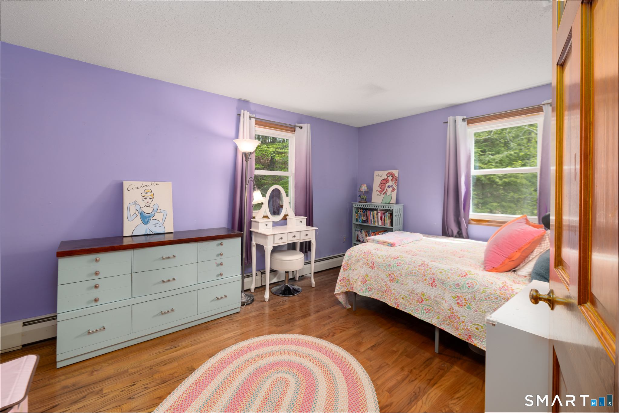 14 Crosswood Road Farmington, CT 06085 - Photo 29 of 39 a bedroom with a bed and large windows