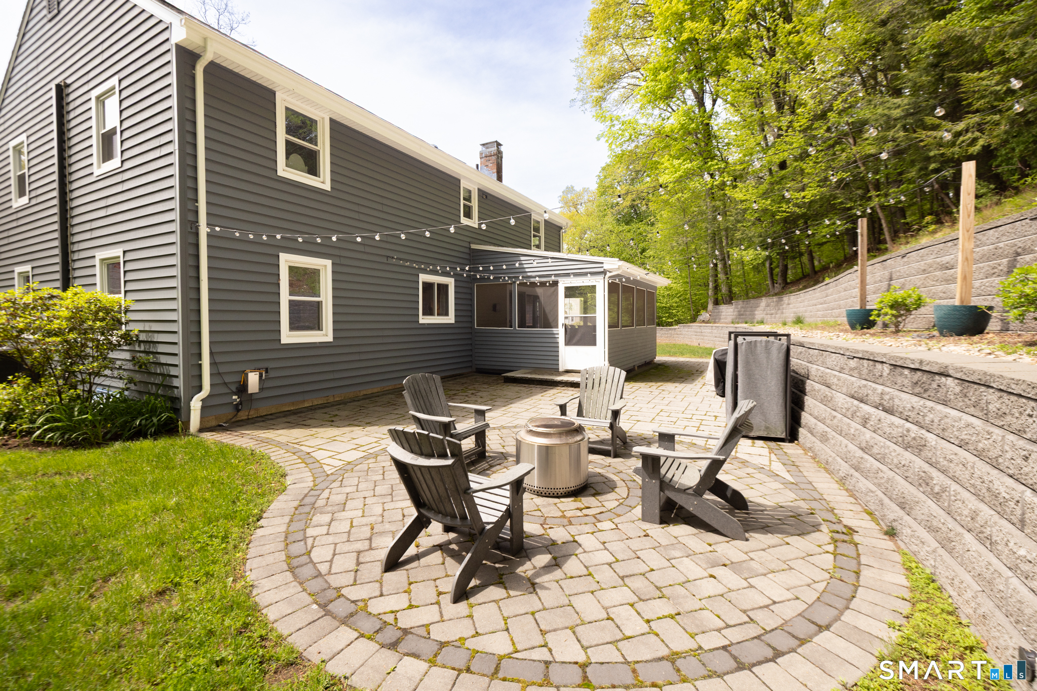 14 Crosswood Road Farmington, CT 06085 - Photo 3 of 39 a view of a house with backyard sitting area and garden