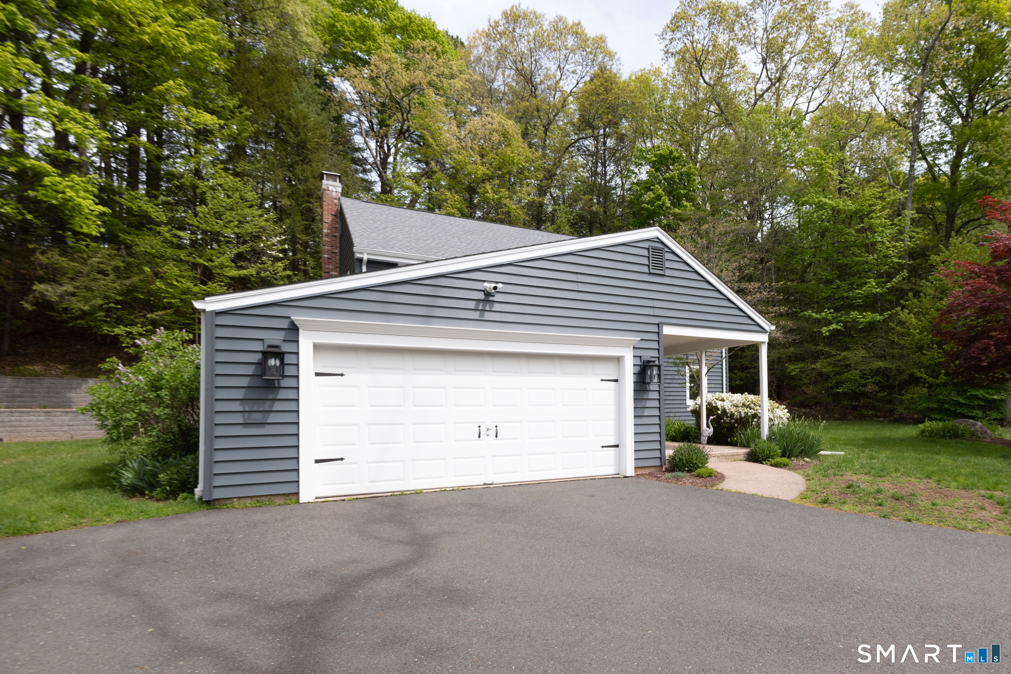 14 Crosswood Road Farmington, CT 06085 - Photo 38 of 39 a view of a house with a yard and garage