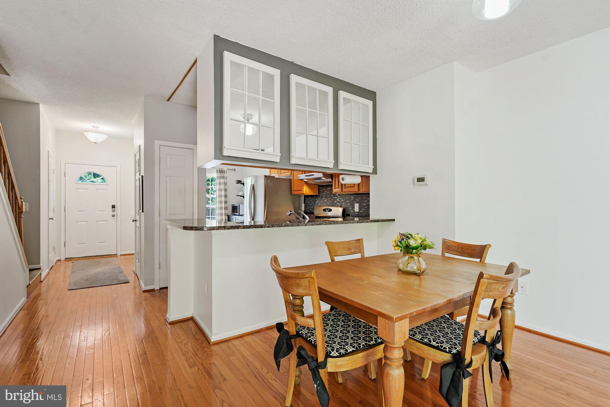 7204 Stover Drive Alexandria, VA 22306 - Photo 7 of 27 Living room towards entry way