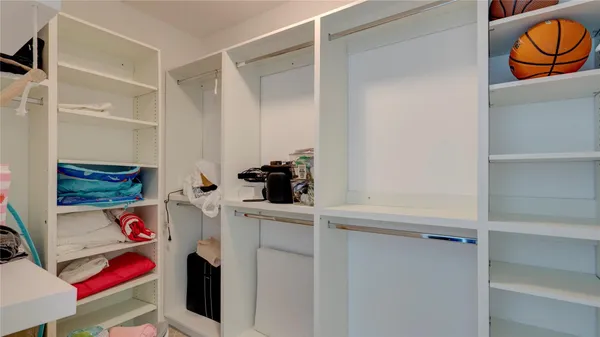 a room with storage and utility
