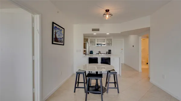 a view of a dining room with furniture