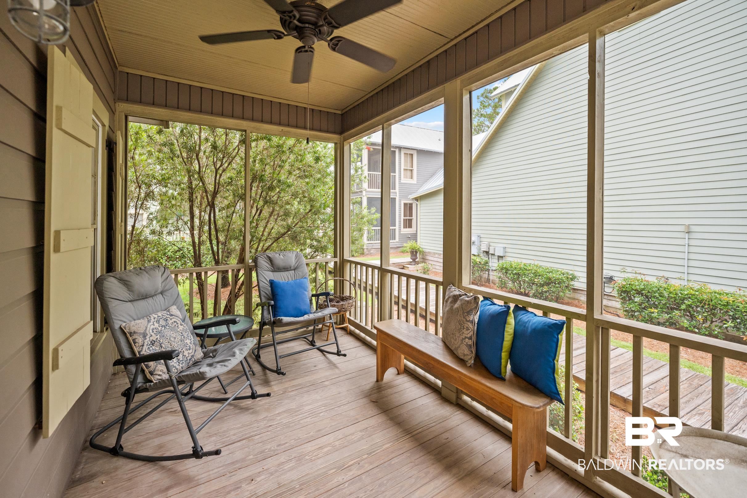 25773 Canal Road, Unit 18 Orange Beach, AL 36561 - Photo 20 of 44 Sunroom / solarium with plenty of natural light and ceiling fan