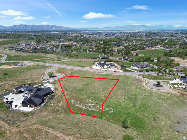 1284 Middle Canyon Court, Unit 69 Mapleton, UT 84664 - Photo 11 of 20 Aerial perspective of suburban area with property boundaries highlighted and a mountain backdrop