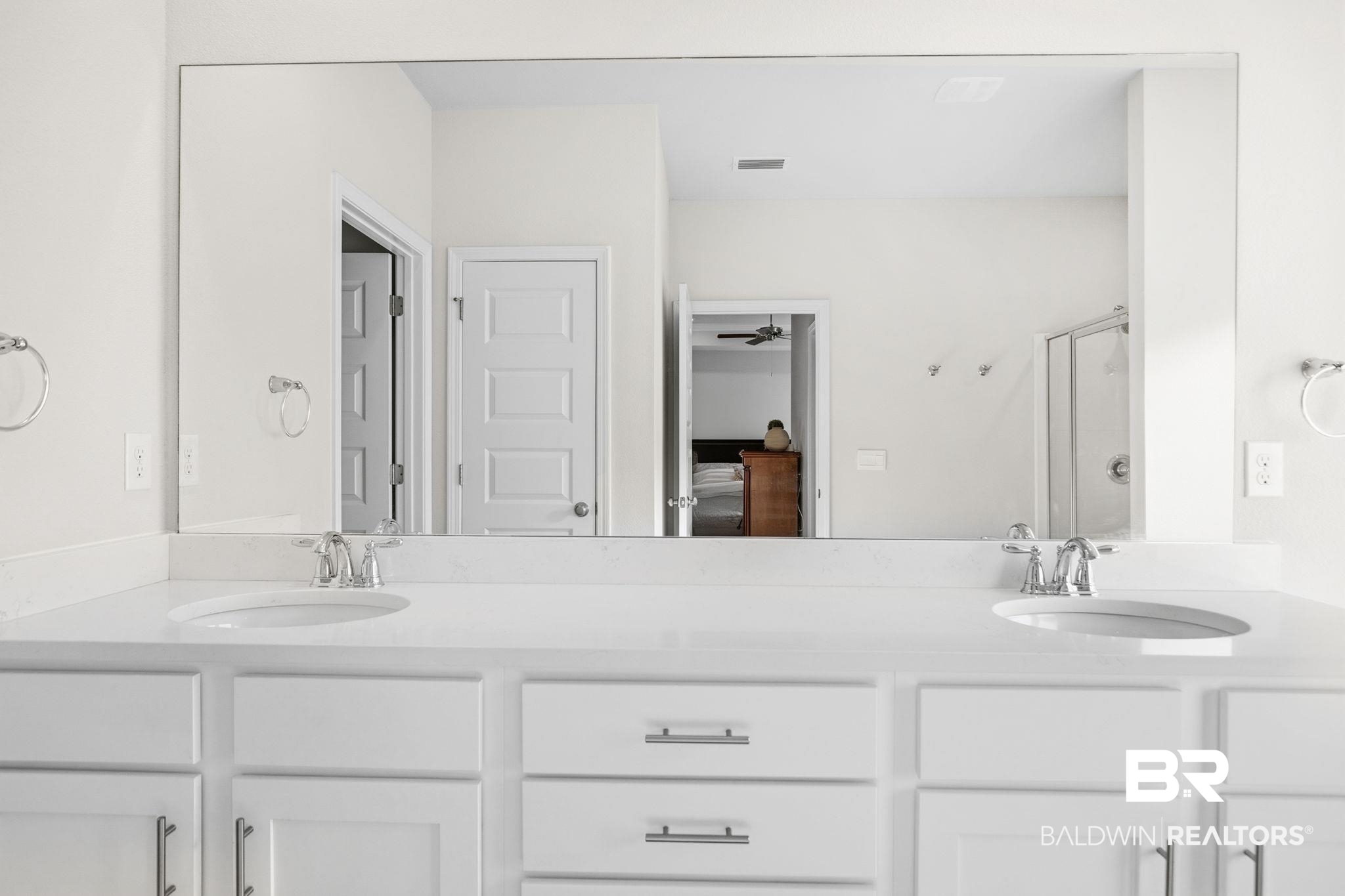 11123 Genuine Risk Circle Daphne, AL 36526 - Photo 28 of 67 Ensuite bathroom with double vanity and a shower stall