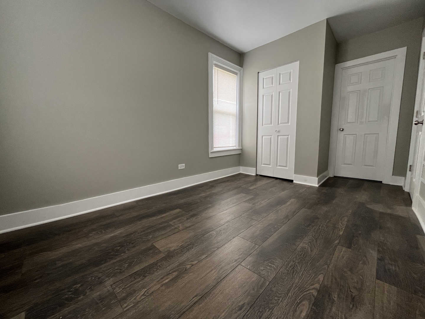 2625 North 3653rd Road Sheridan, IL 60551 - Photo 5 of 25 a view of empty room with wooden floor and fan