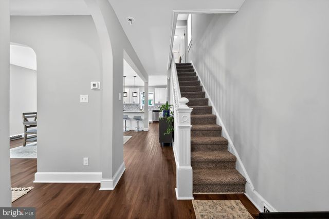 a view of entryway with wooden floor