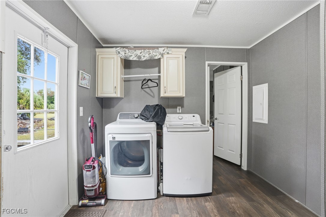 2491 Farrance Court North Fort Myers, FL 33917 - Photo 23 of 26 a utility room with dryer and washer