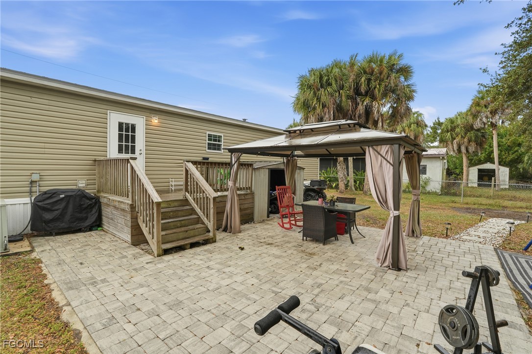 2491 Farrance Court North Fort Myers, FL 33917 - Photo 24 of 26 a view of a house with patio
