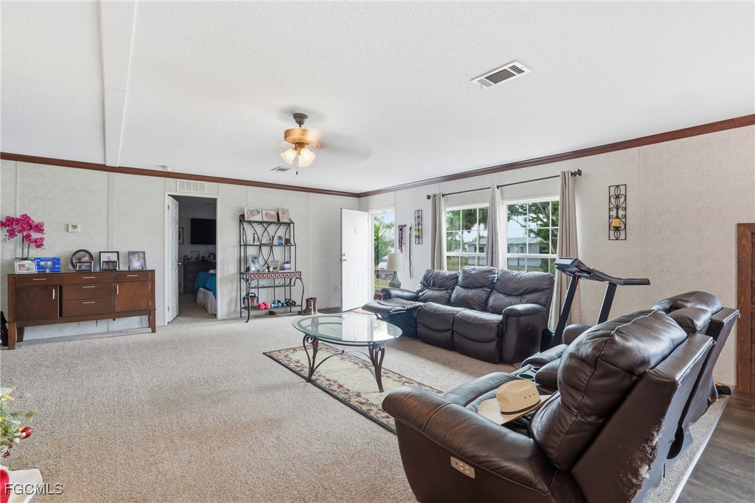2491 Farrance Court North Fort Myers, FL 33917 - Photo 6 of 26 a living room with furniture and window