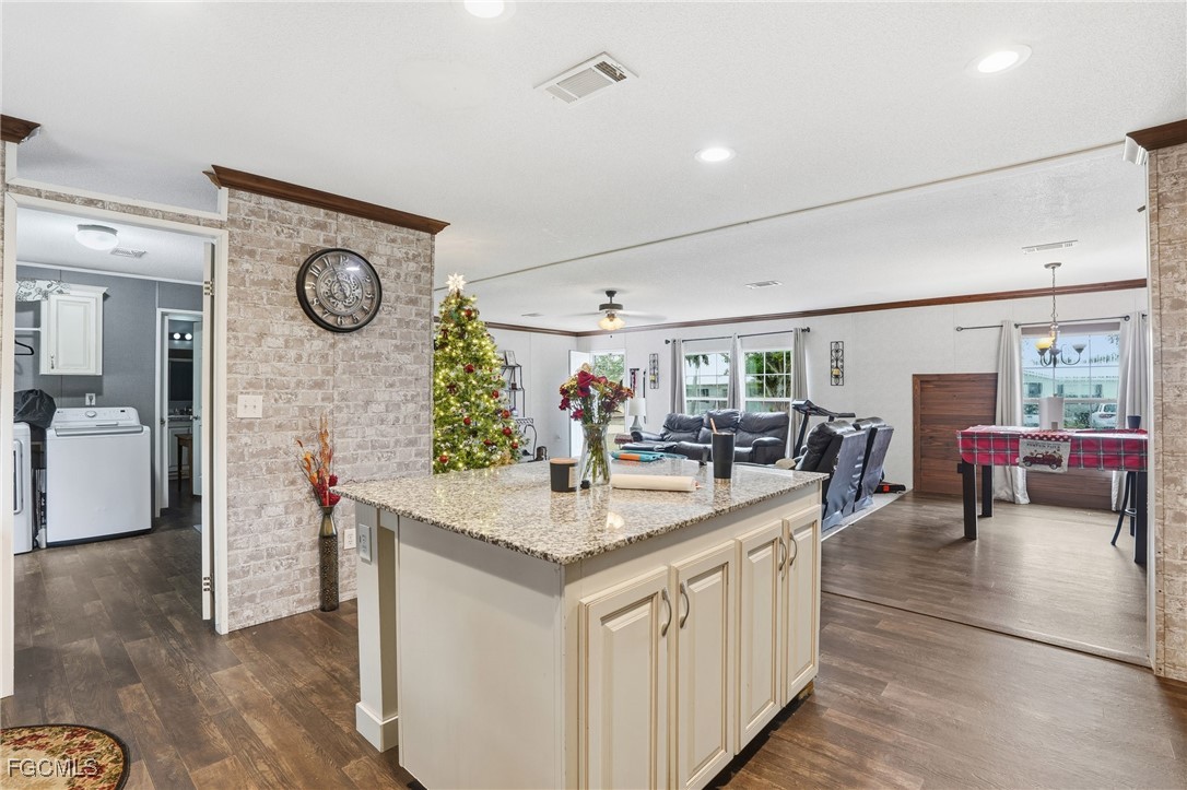 2491 Farrance Court North Fort Myers, FL 33917 - Photo 10 of 26 a view of living room and kitchen