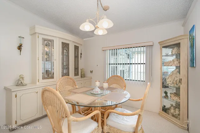 a kitchen with a sink appliances and cabinets