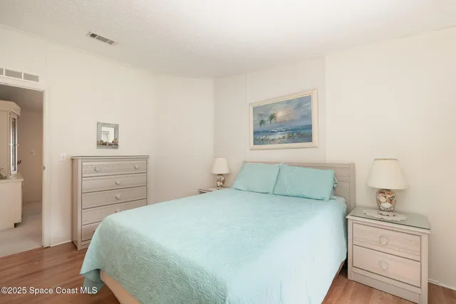 a view of a bathroom with a sink and mirror