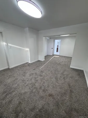 an empty room with a natural light