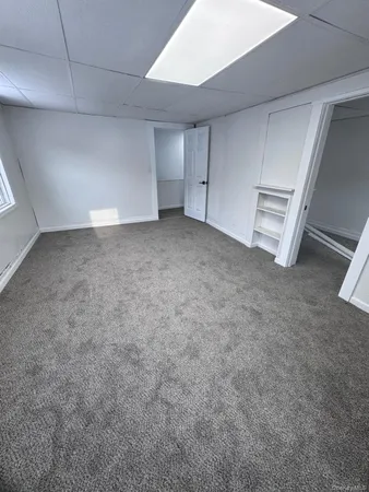 a view of empty room with a window